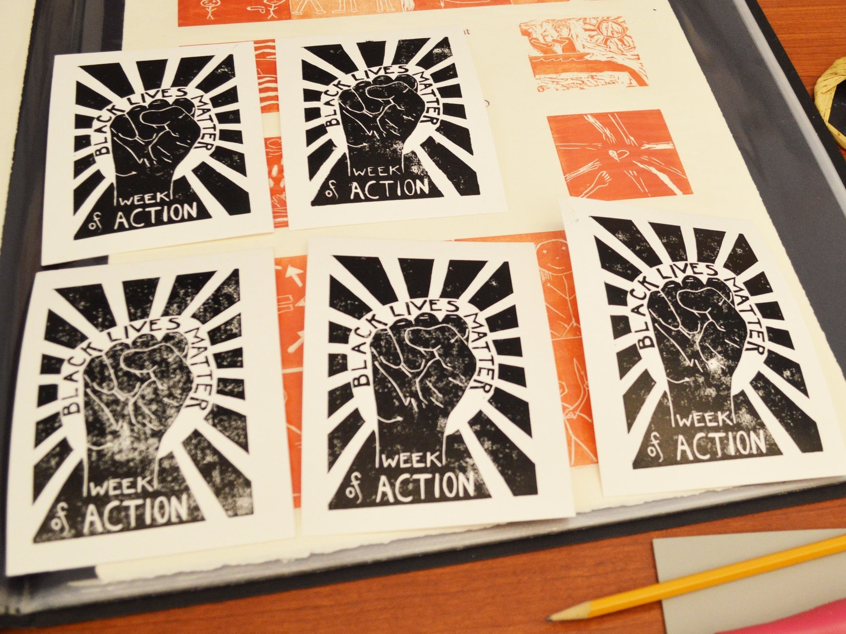 Alex Huttsinger demonstrated how to make social justice prints.