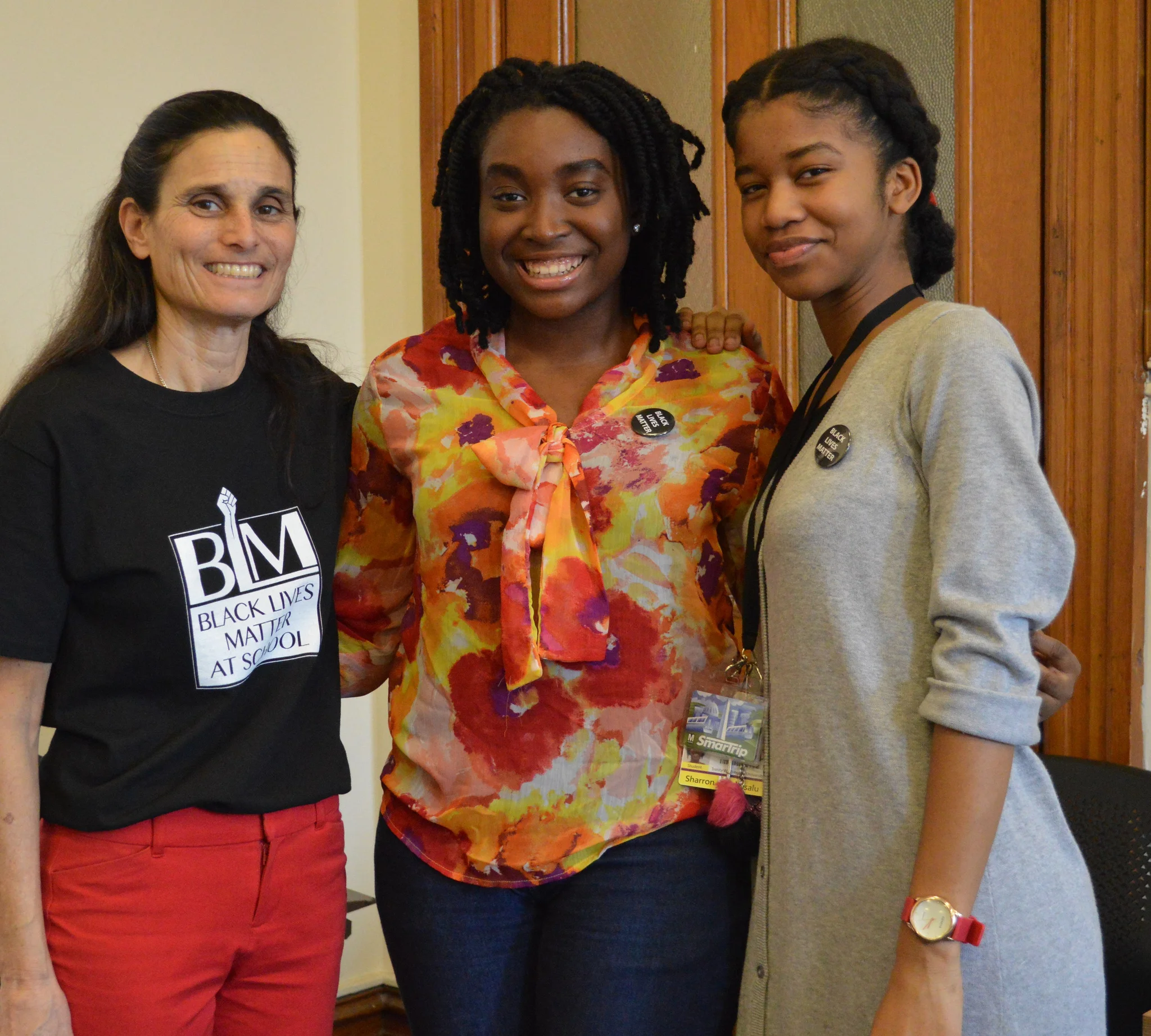 Teacher Jill Weiler and student discussion leaders for the second class, Golden Emokpaire and Sharron-Rose Kisalu.