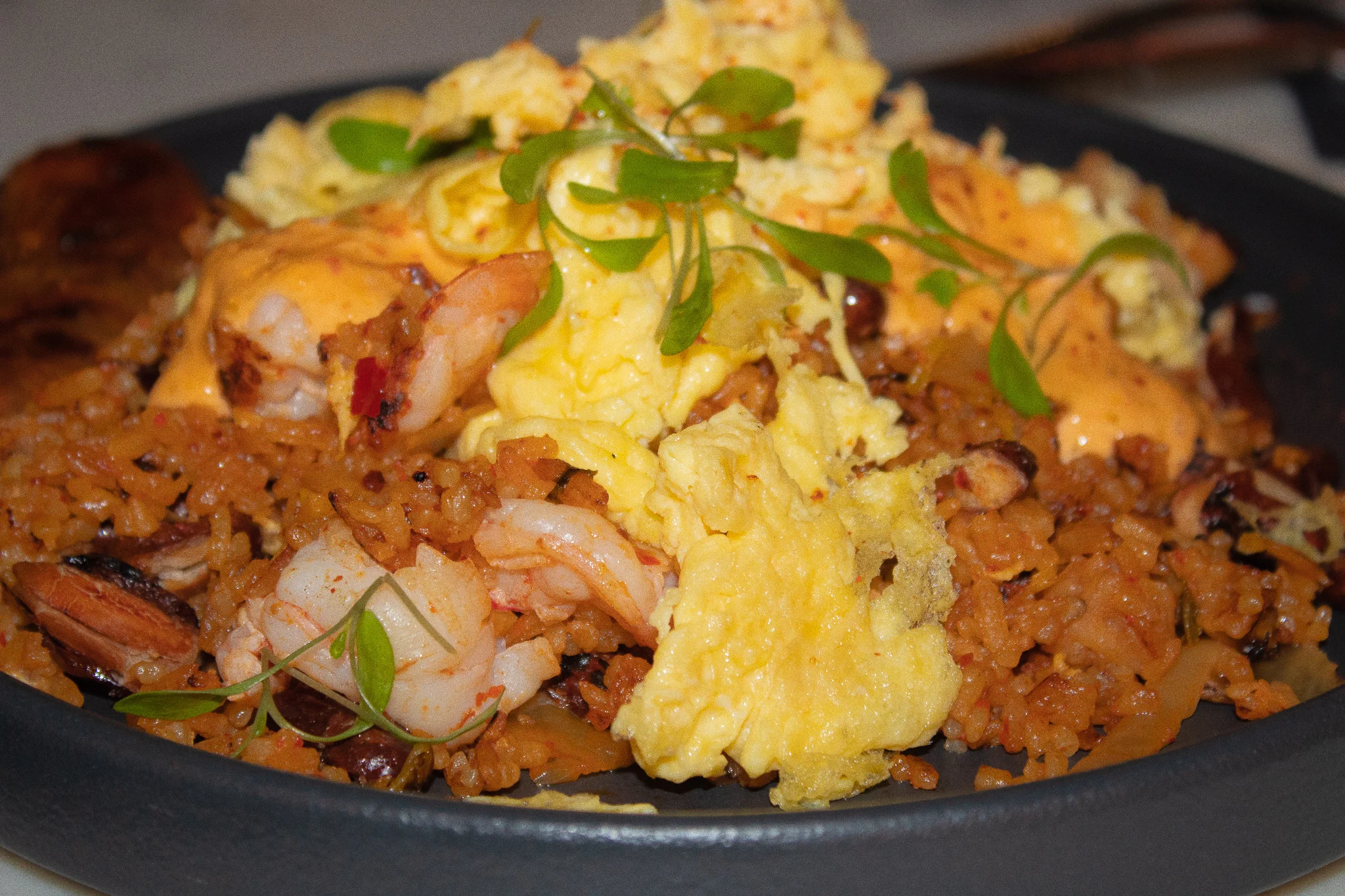 "Locrio" - shrimp fried rice and beans, 2 sunny eggs, kimchi slaw, Beatstro sauce