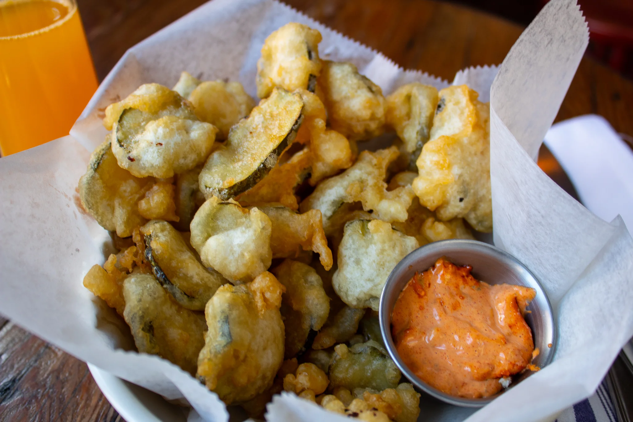 Beer Battered Pickles - Round slices fried in pale ale batter, spicy remoulade