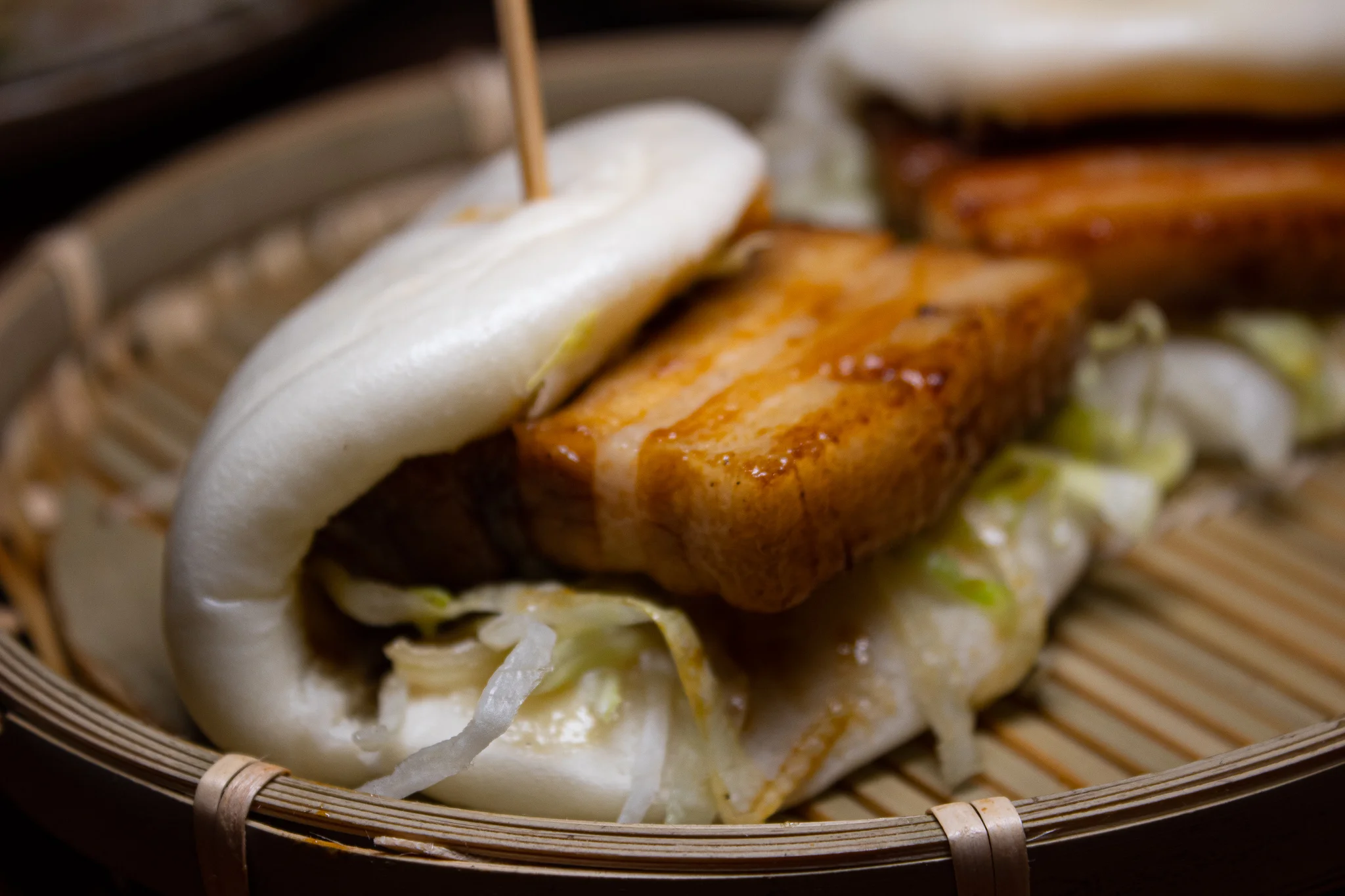 Pork Bun - soy glazed pork belly, pickled vegetables, mustard seeds, bean paste aioli