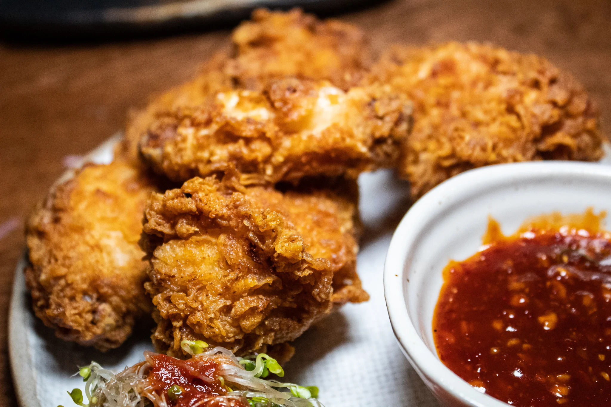 Chicken Wings - fried, buttermilk battered, pickled radish