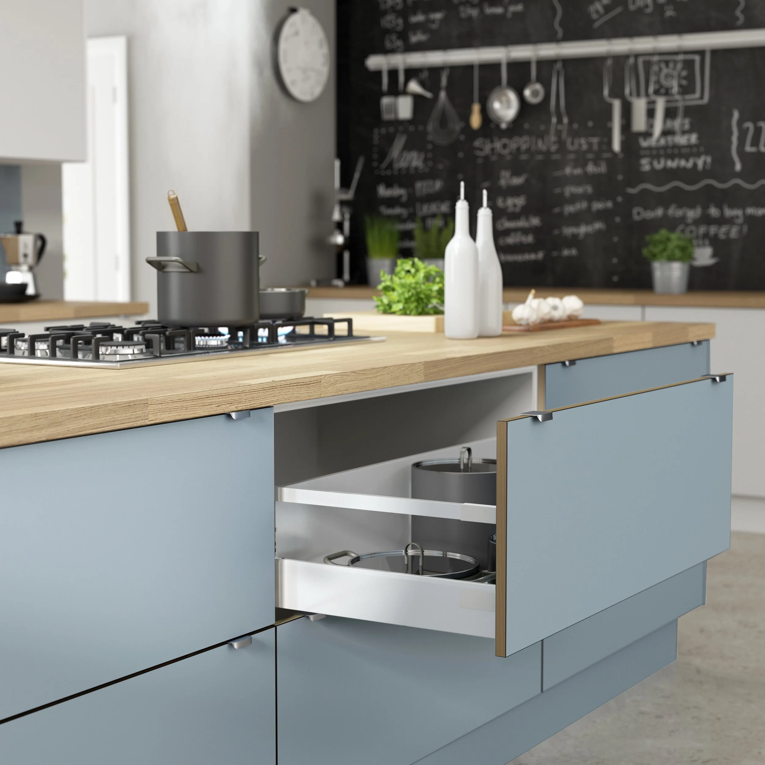 Modern kitchen island with matte blue cabinets, light wood countertop, pull-out drawer storage organizer, and built-in gas cooktop in contemporary kitchen design.