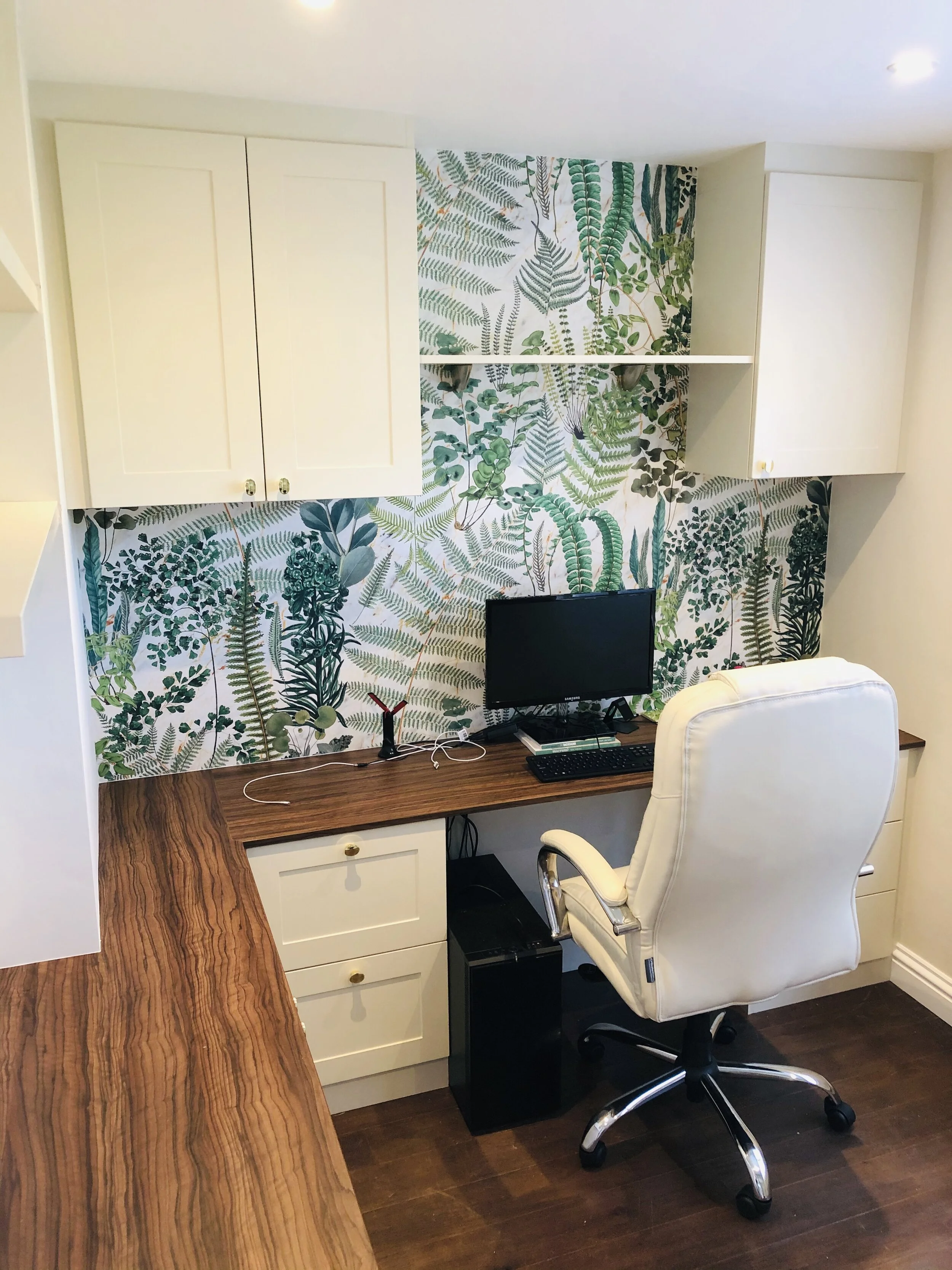 Custom home study desk with built-in drawers and shelving in West Sussex