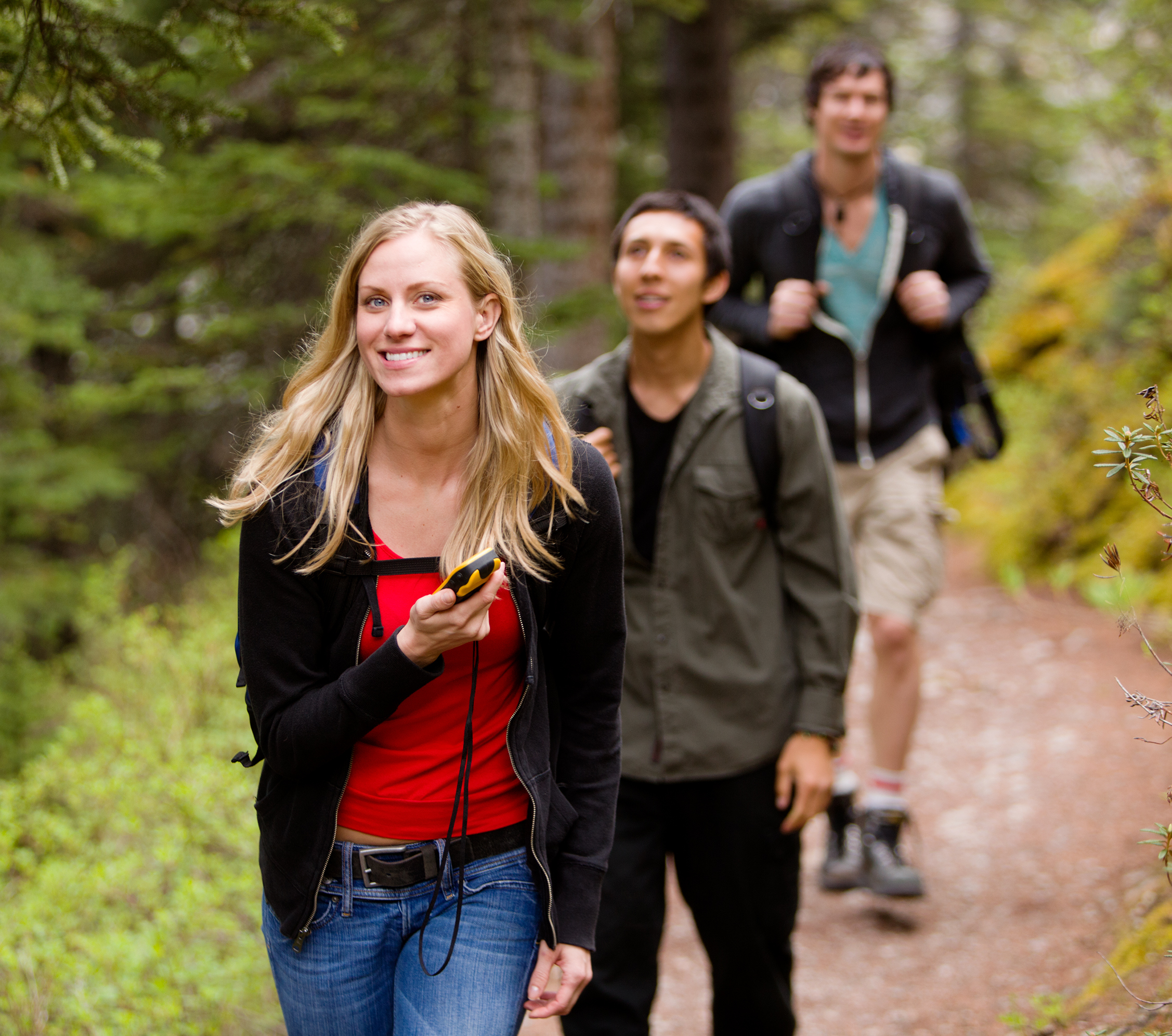 A small team goes hiking as part of a geoteaming team building exercise