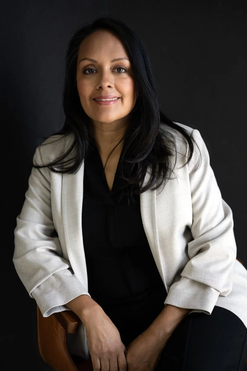 headshot woman white blazer.jpeg