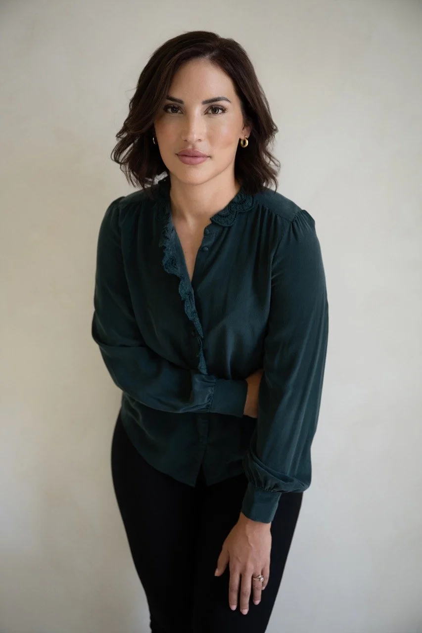 headshot woman green blouse.jpeg