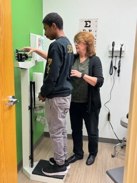 Lynelle and patient at CH.jpg