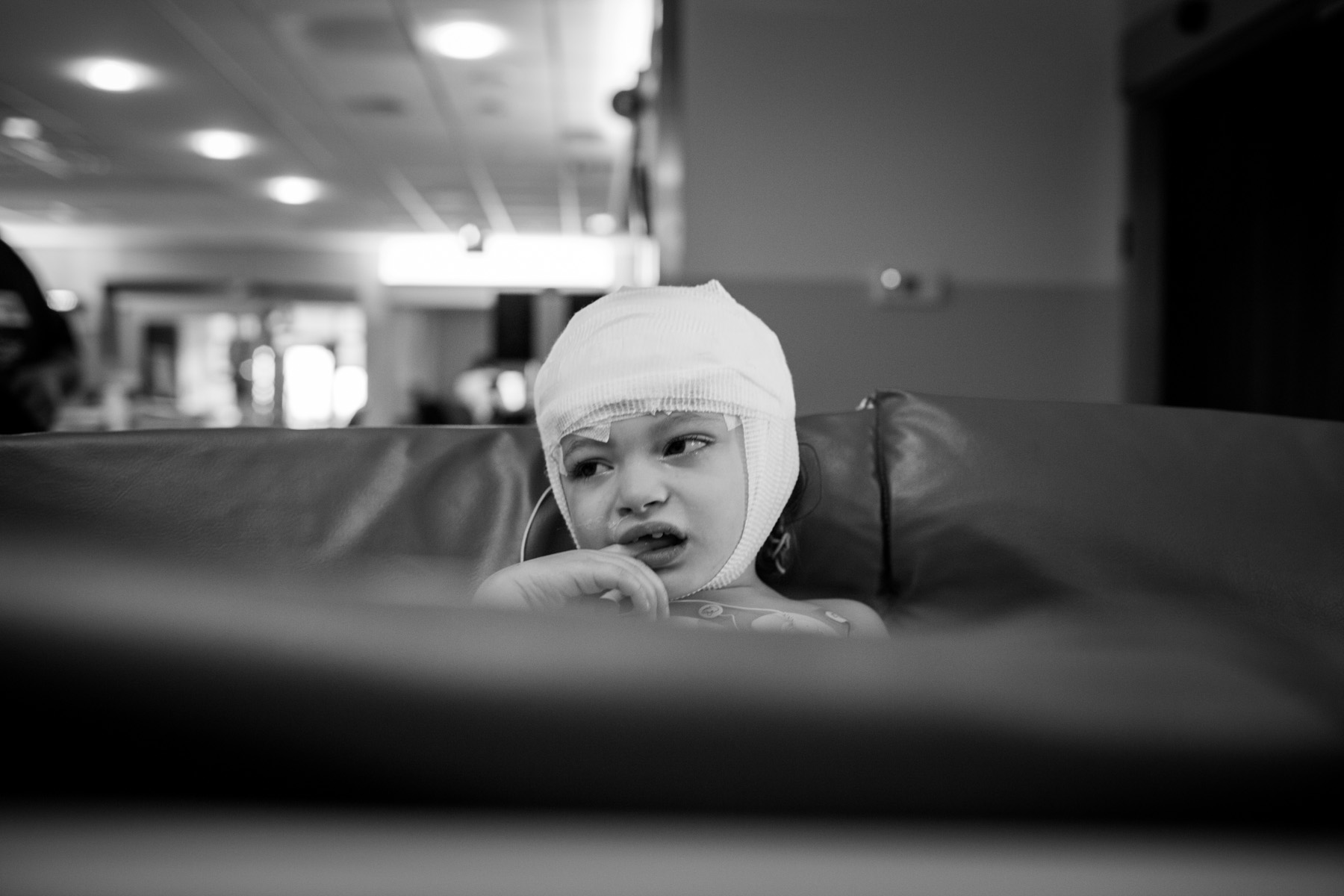 Arianna is wheeled through the Upstate Golisano Children's Hospital while recovering from her most recent brain surgery. At three years old, Arianna has gone through three brain surgeries in the past year and a half.