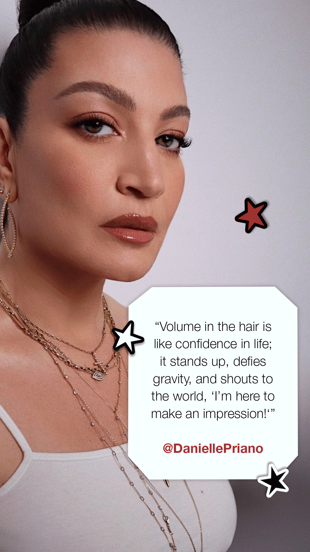 A woman with brown hair tied back, wearing gold jewelry, looking confidently at the camera. Text on image reads: 'Volume in the hair is like confidence in life; it stands up, defies gravity, and shouts to the world, ‘I'm here to make an impression!’ @DaniellePriano.