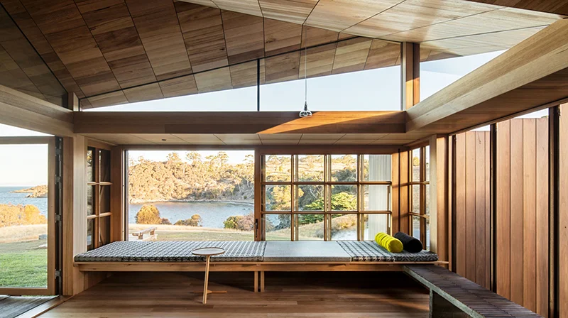 Dramatic panoramic views across the coastline of the north end of Bruny Island from Captain Kelly’s Cottage by John Wardle Architects . Photo – Trevor Mein .