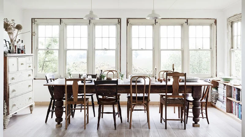 The home of Tamsin Carvan of Tamsin’s Table features charmingly mis-matched antique dining chairs. Photo – Eve Wilson .