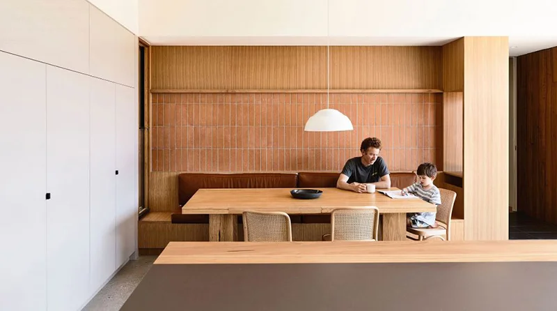 Tonal textures in this Brunswick home are layered in this cleverly designed space, to create a comfortable dining area which is a real focal point of the house. Photo – Derek Swalwell .