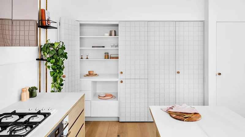 Wall to wall cupboards are all well and good, but it’s what’s inside that counts. The inside of this pantry has been designed by The Stella Collective specifically for purpose to provide maximum efficiency in the apartment. Interiors – The Stella Collective . Photo – Maegan Brown .