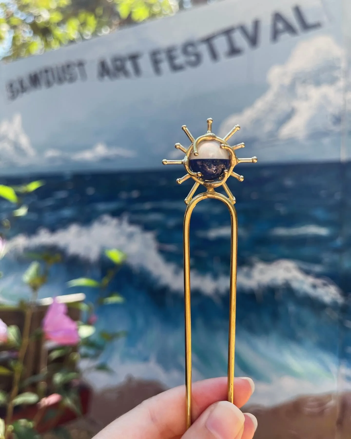 Only 3 week left in the show! Come down and check out all our handcrafted jewelry at Booth 312.

These are our Stone Hair Pics, each one is handcrafted out of solid bronze and feature genuine stones and shells. We are constantly creating throughout t