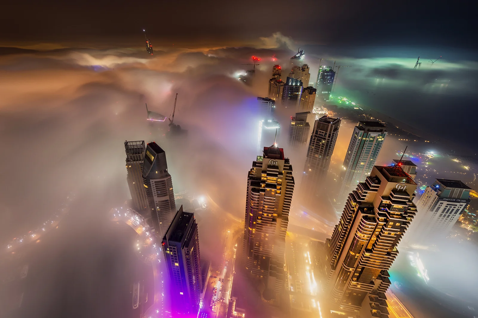 Dubai Marina fog at night