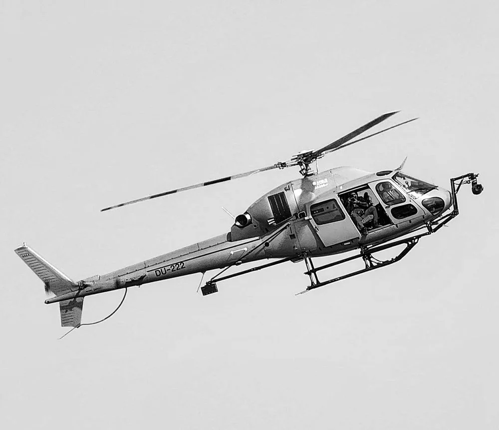 Helicopter in flight during an aerial photography assignment in Dubai
