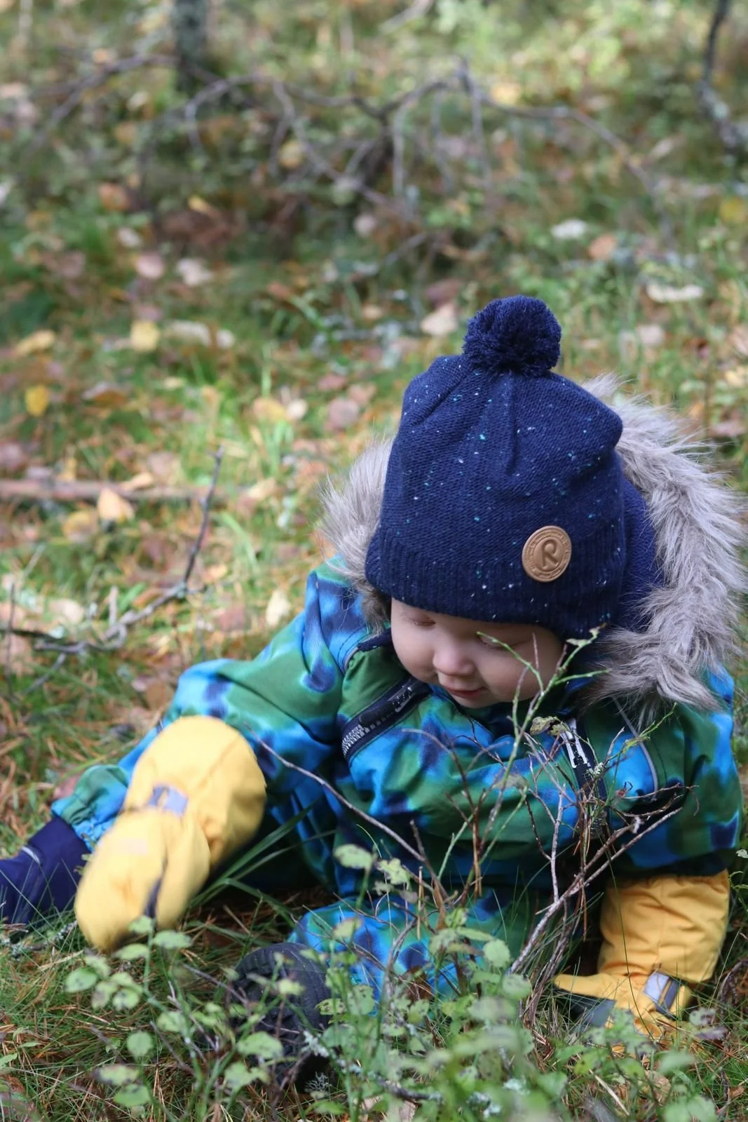 Marianne blog- sitting in forest looking at flowers.jpeg