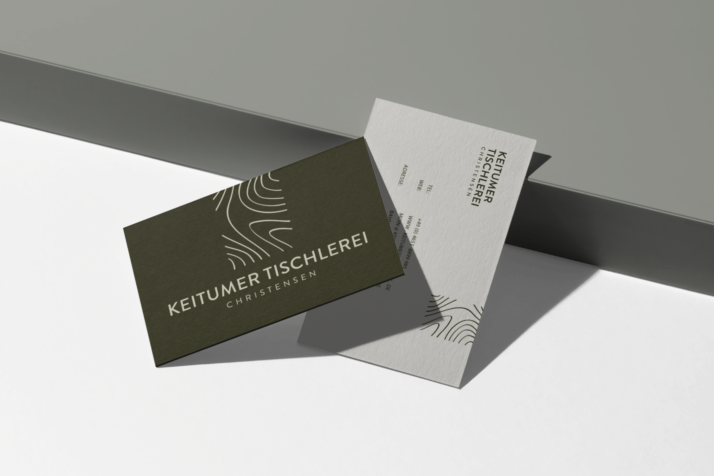 business-card-mockup-scene-65a95d5bf025307f2bd248e5@2x.png