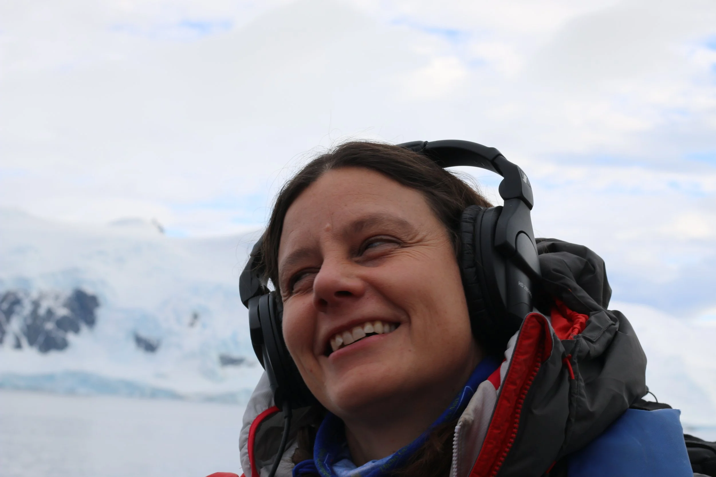 Sam Headshot_Headphones_LauraT_IMG_6668.JPG