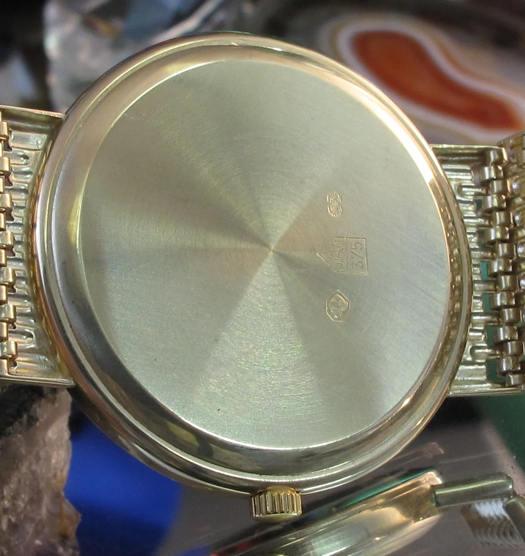 Rolex sub gold black Movements (14 of 36).jpg
