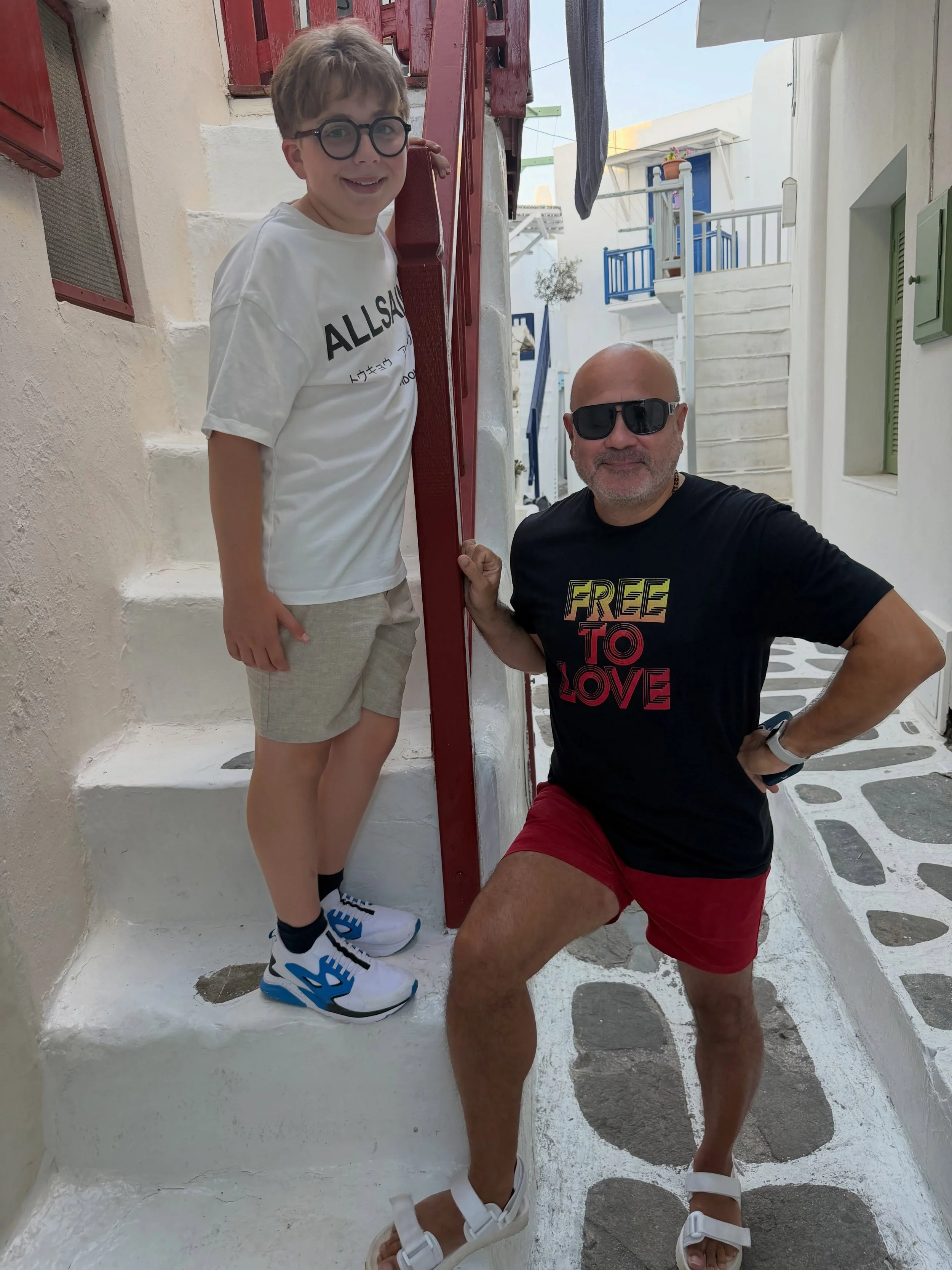 Walking through the beautiful, winding streets of Mykonos Town 🇬🇷💙

One of the things we love most about Mykonos is how genuinely LGBT+ friendly it feels. As two gay dads travelling with our son, we&rsquo;ve experienced nothing but warmth, accepta