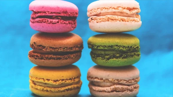 Six delicious macarons. Image: Baher Khairy on Unsplash, cropped by the Unsplash add-on in Google slides.