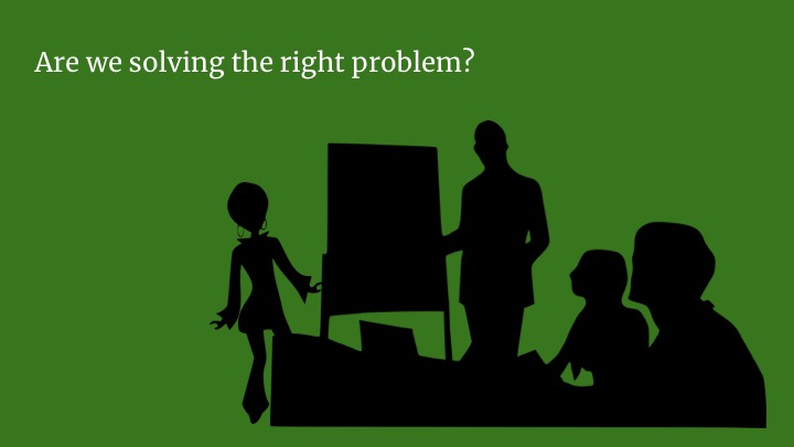  A while later, she gets talking with people on a nearby team. They seem to have a different idea of what problem they're all solving and they're going in a different direction. She sets up a meeting with System Designer on her team and asks a lot of