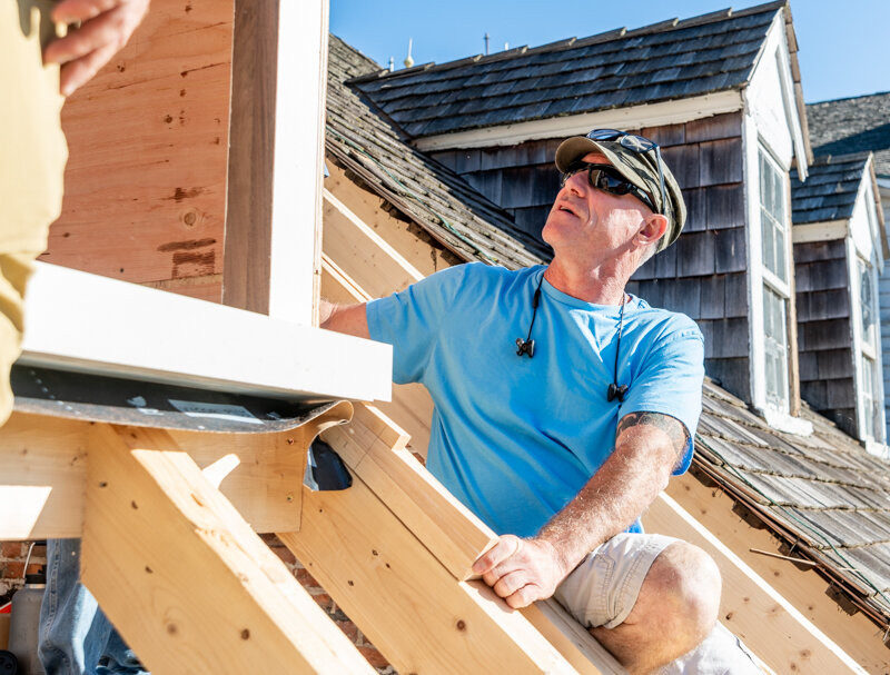  John Gaver of Lynbrook of Annapolis working on a new dormer. 