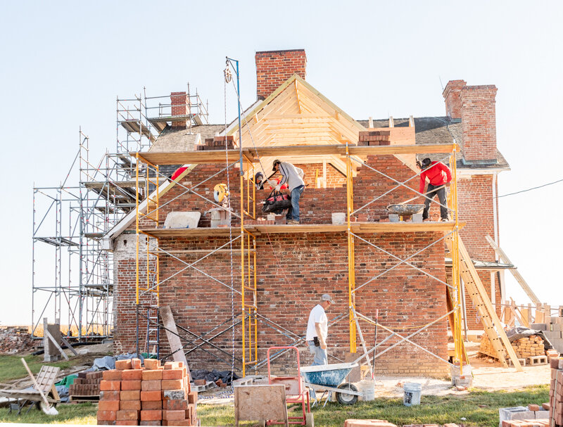  The brick gable end of the kitchen being rebuilt. 