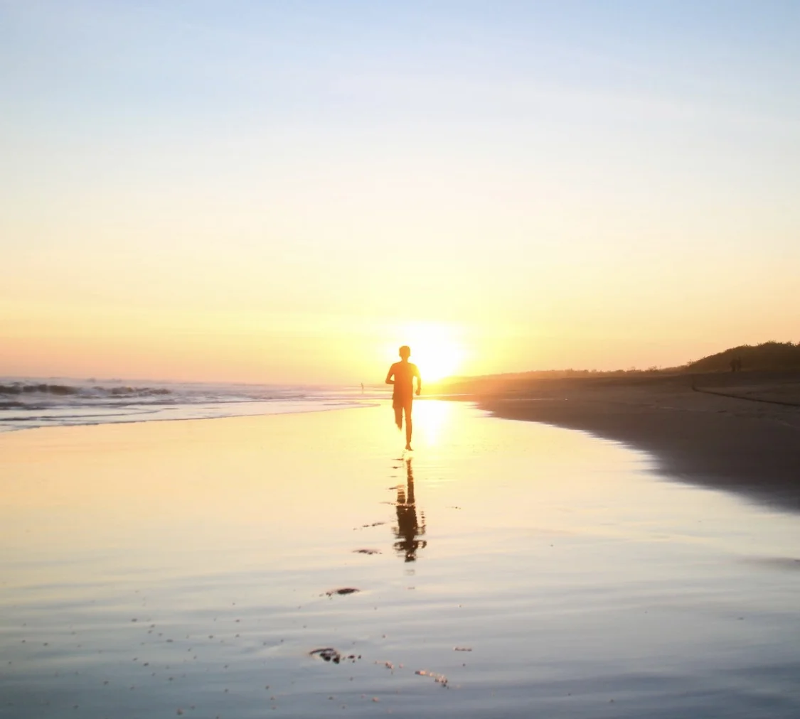 Running on the beach during low tide