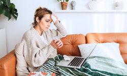 Rundown woman whose is sick and still trying to work