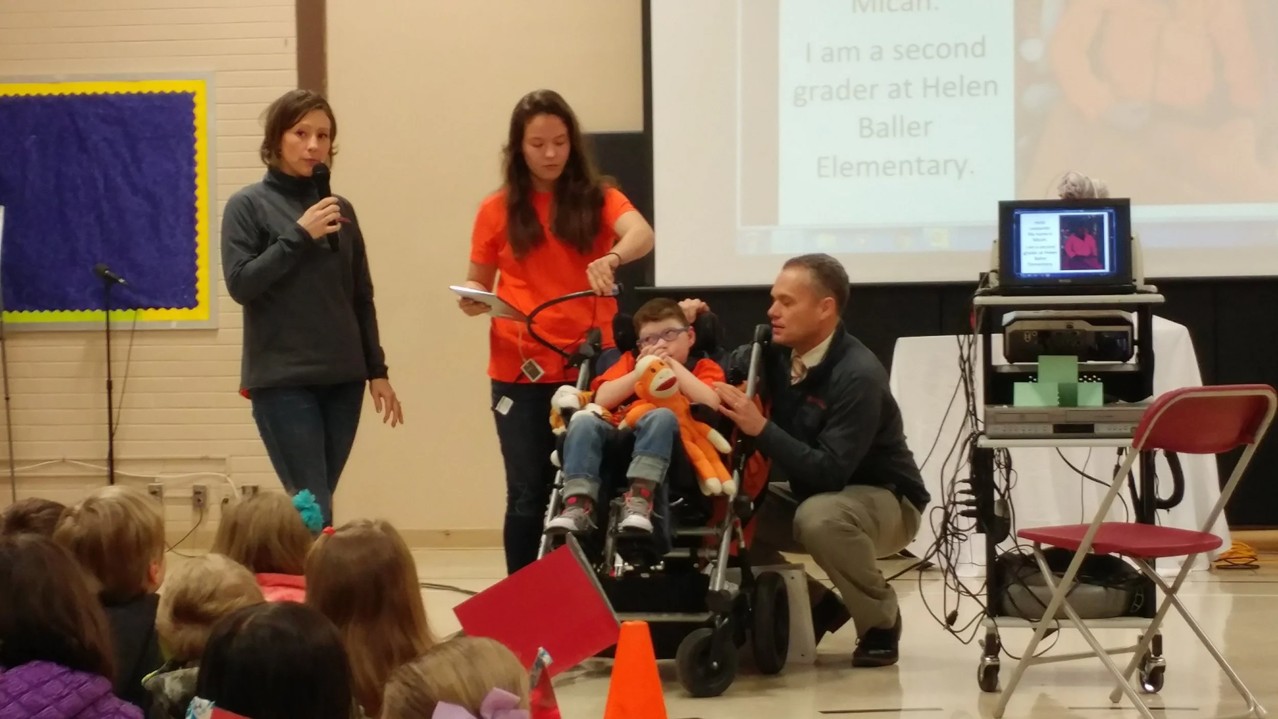 The Micah's Miles Team making a presentation at an elementary school.