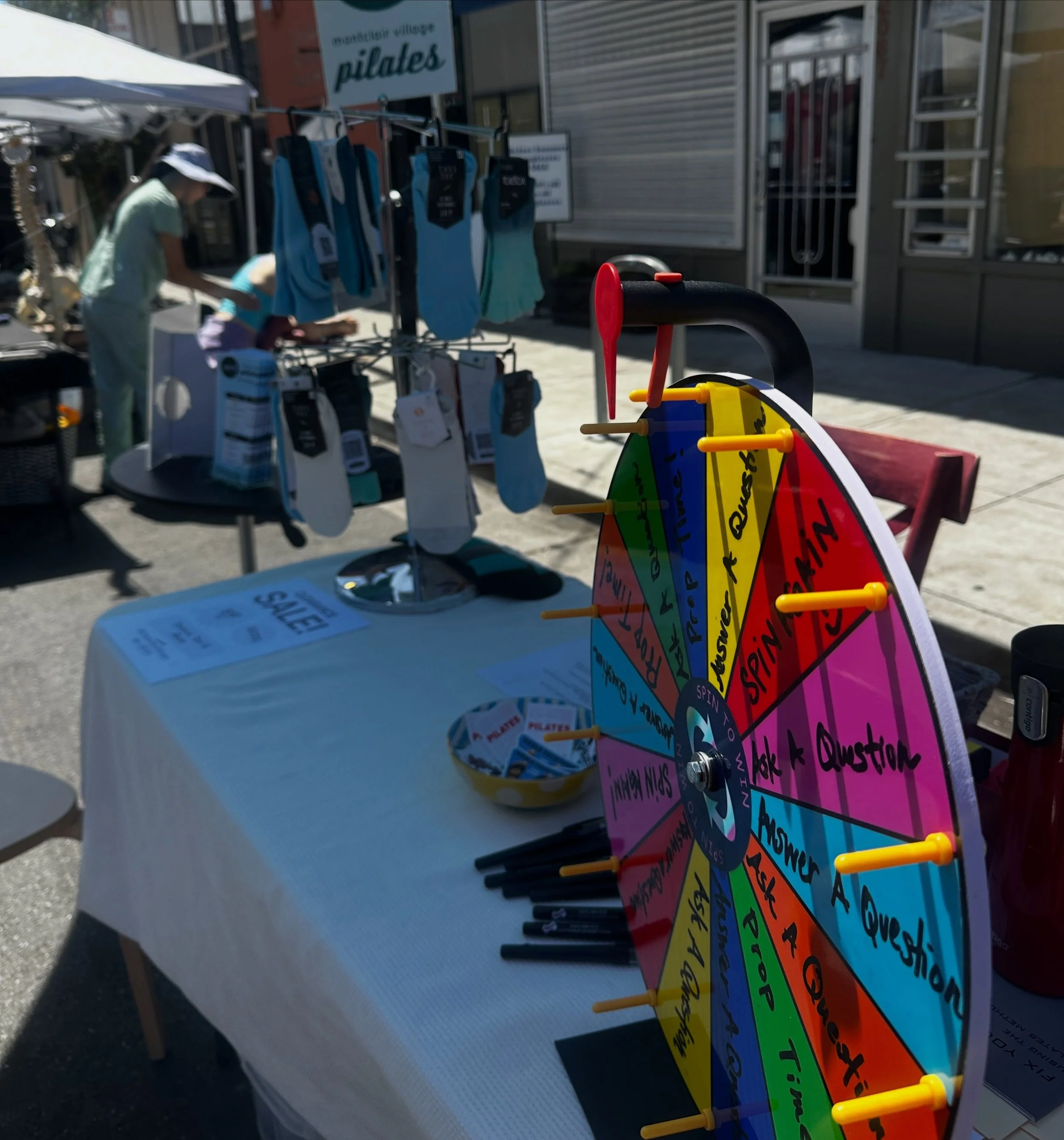 Our cute &amp; colorful table at the PoP! #pilates #picnicontheplaza #montclairvillage
