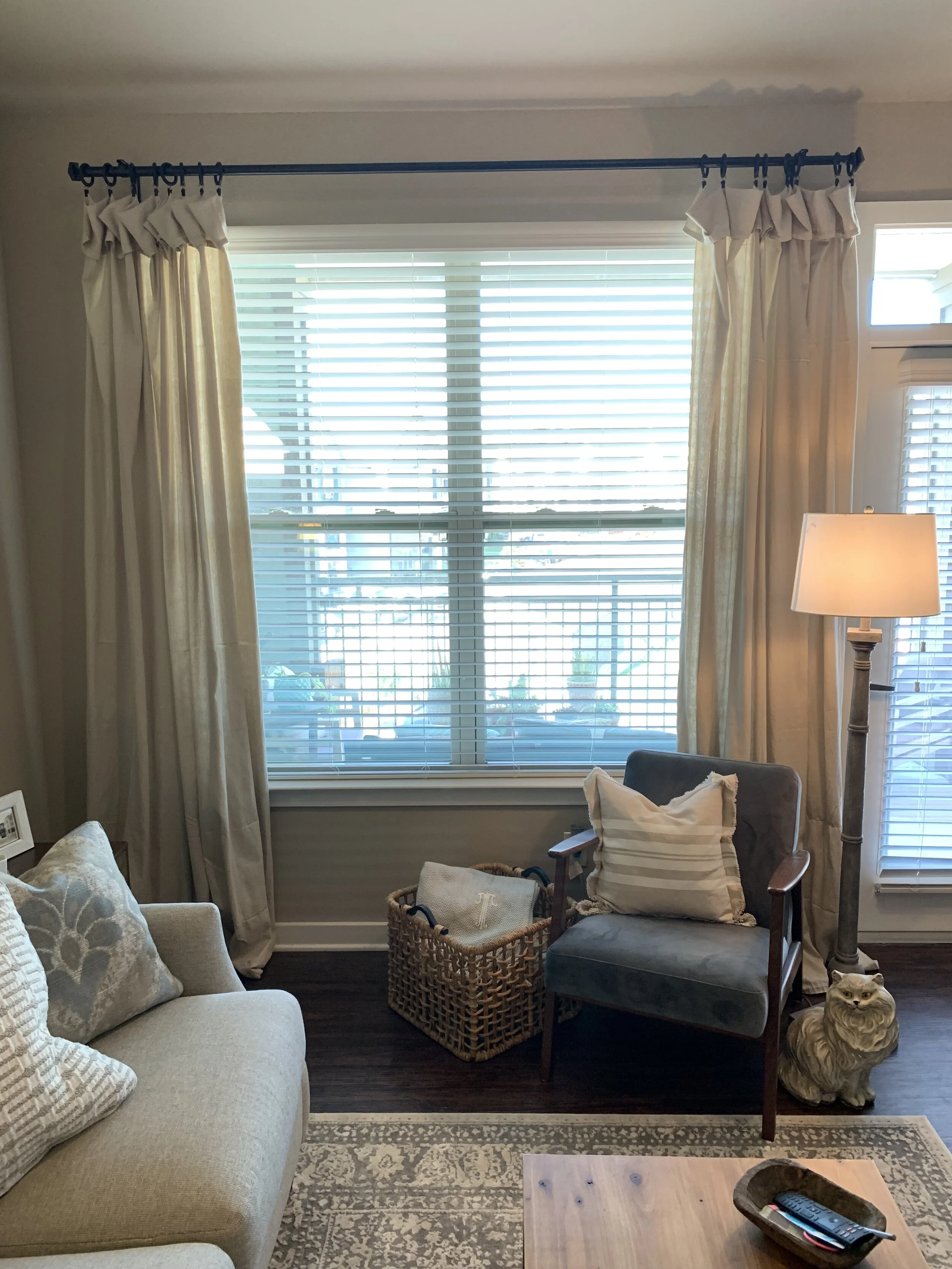 Drop cloth curtains for the win! I probably spend $25 on the entire set up, including the curtain rod!