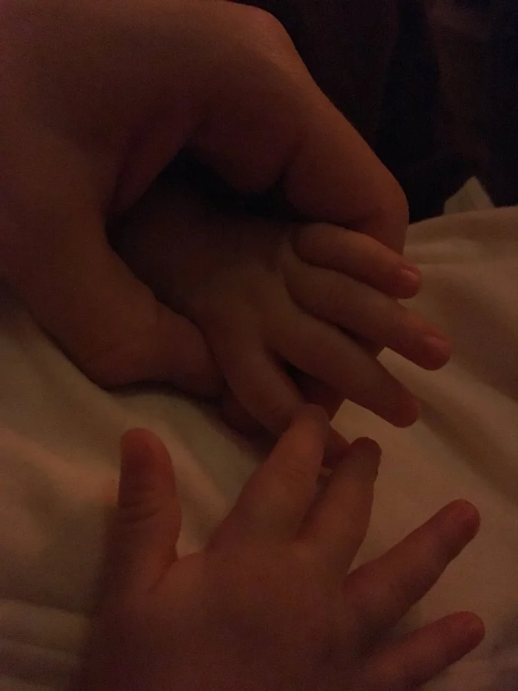 Being a parent of babies at the same time is so helpful at points. Just to come home and hold hands with this little one. 
