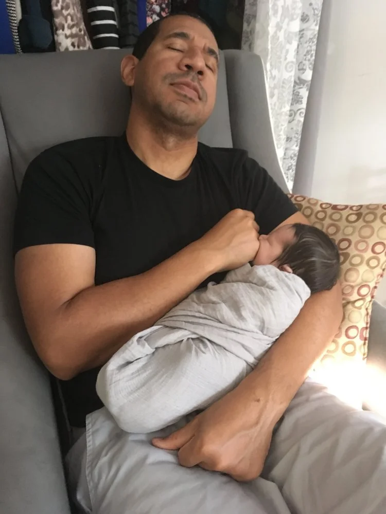 Five days after our little guy was born. Don't worry safety patrol, the big guy is not actually asleep, just wishing he was. The baby? Yeah, the baby is asleep. 