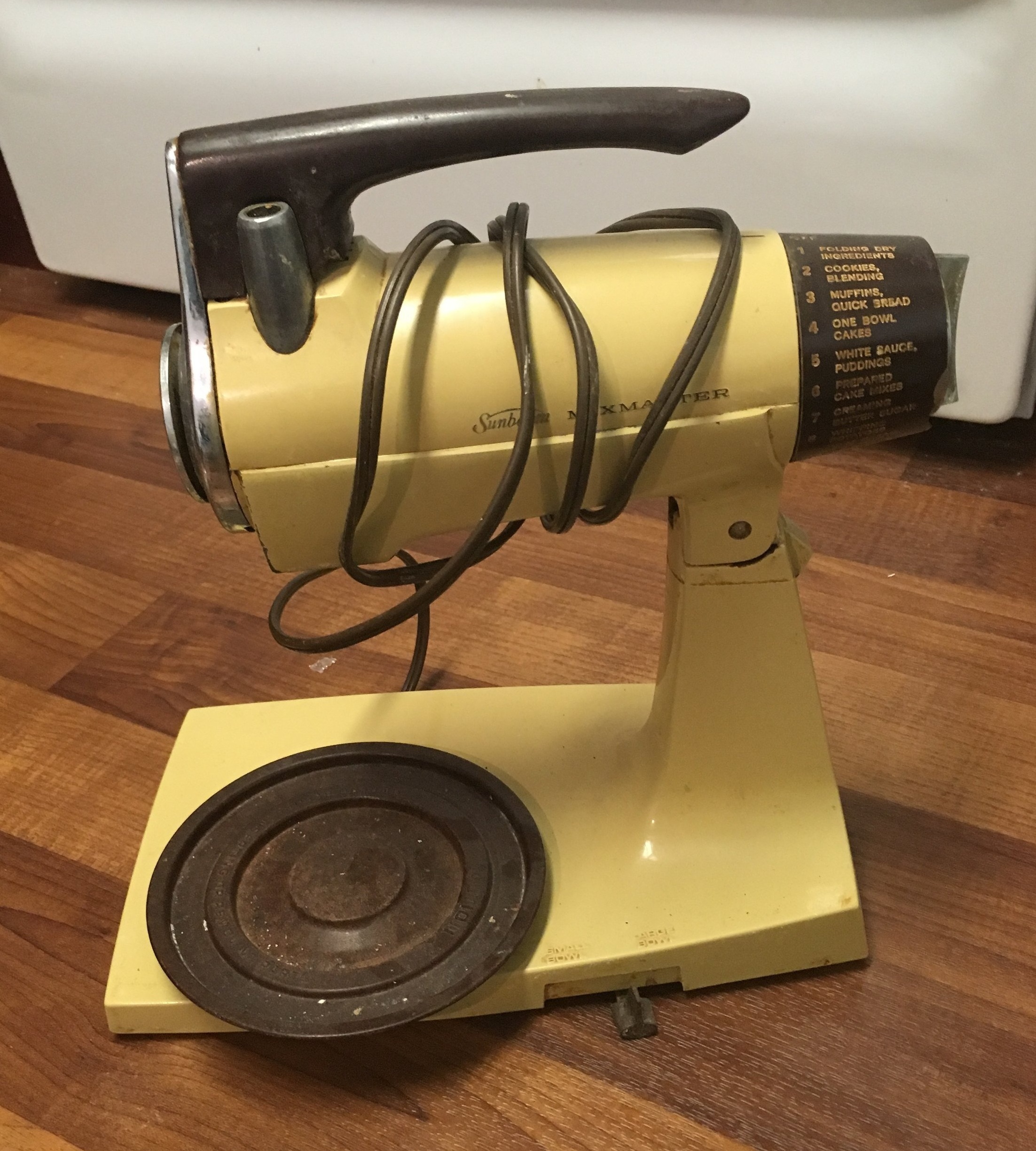 We found this guy in the cabinet while packing. Likely 40 years old? Silly appliance but I can almost smell the spritz cookies, “bally bally rolls” and cakes that came from this mixer.