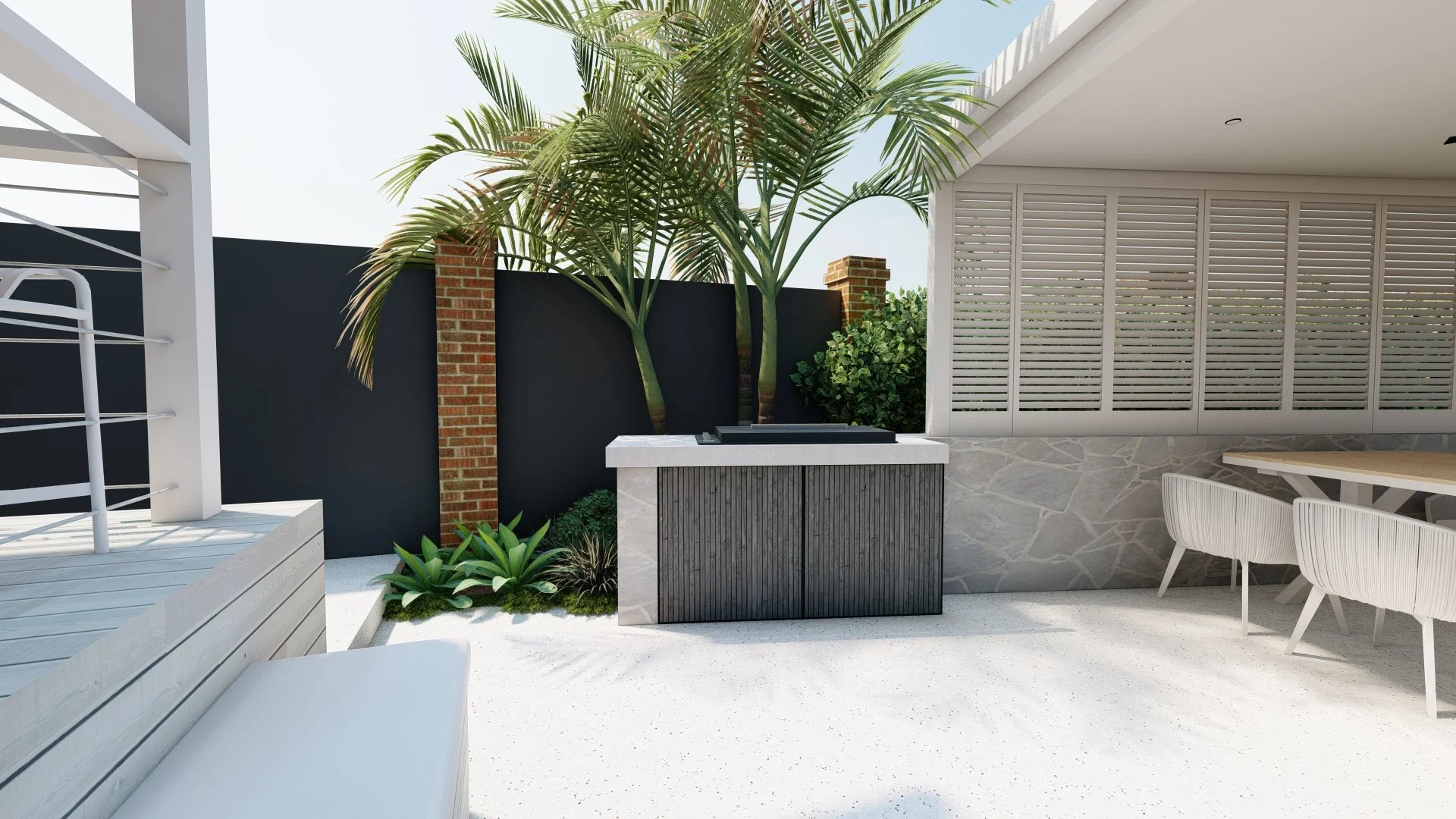 Modern outdoor patio area with tropical plants, a black fence, and seating.