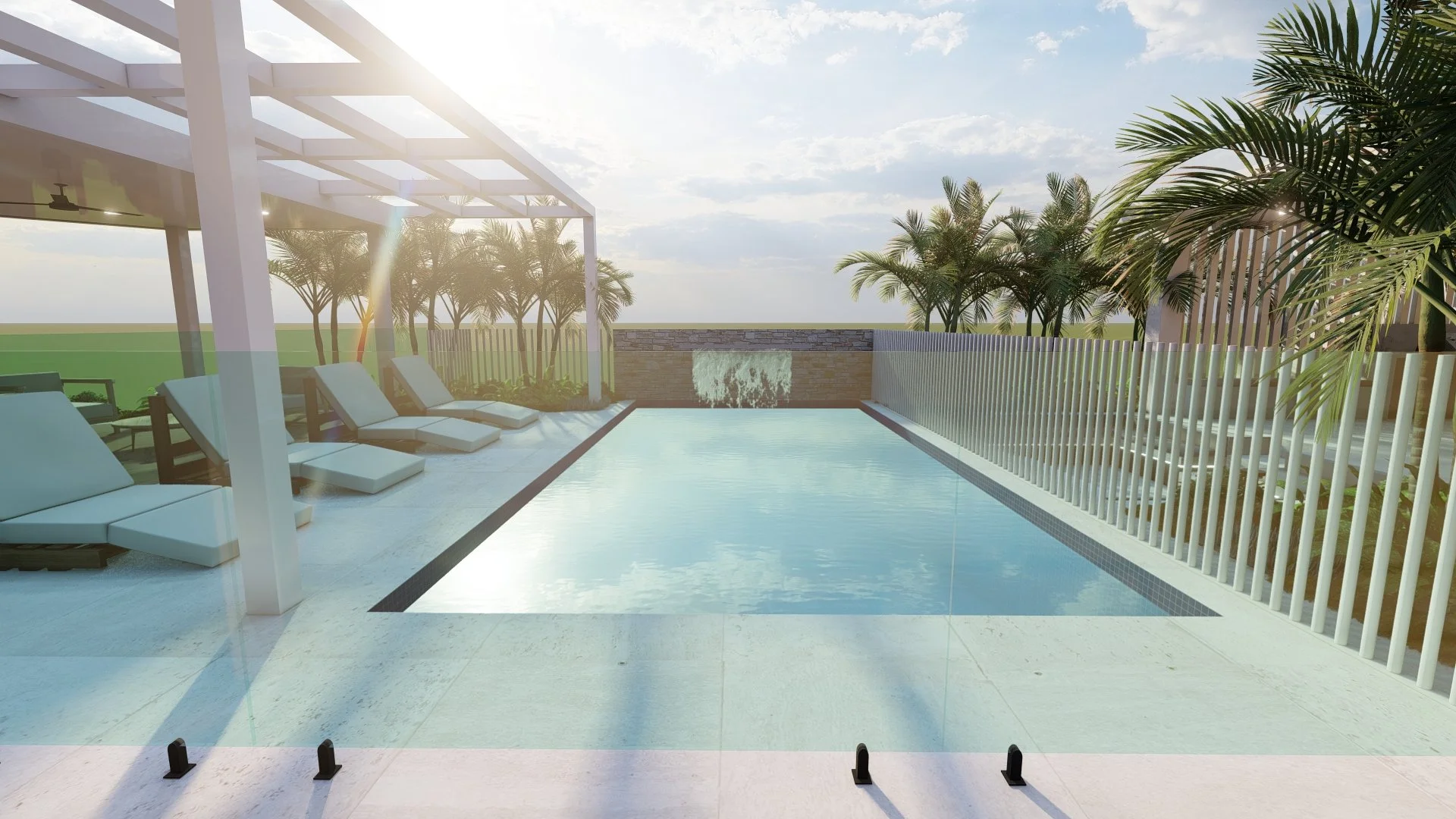 A modern rooftop pool area with lounge chairs, a cascading water feature, and tropical palm trees under a partly cloudy sky.