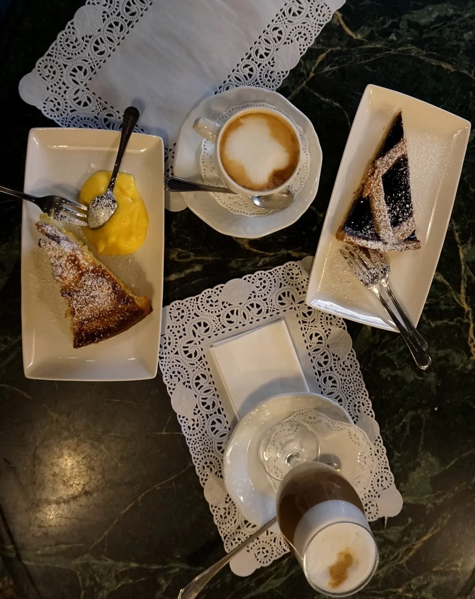 Italian-style breakfast with cappuccino and pies