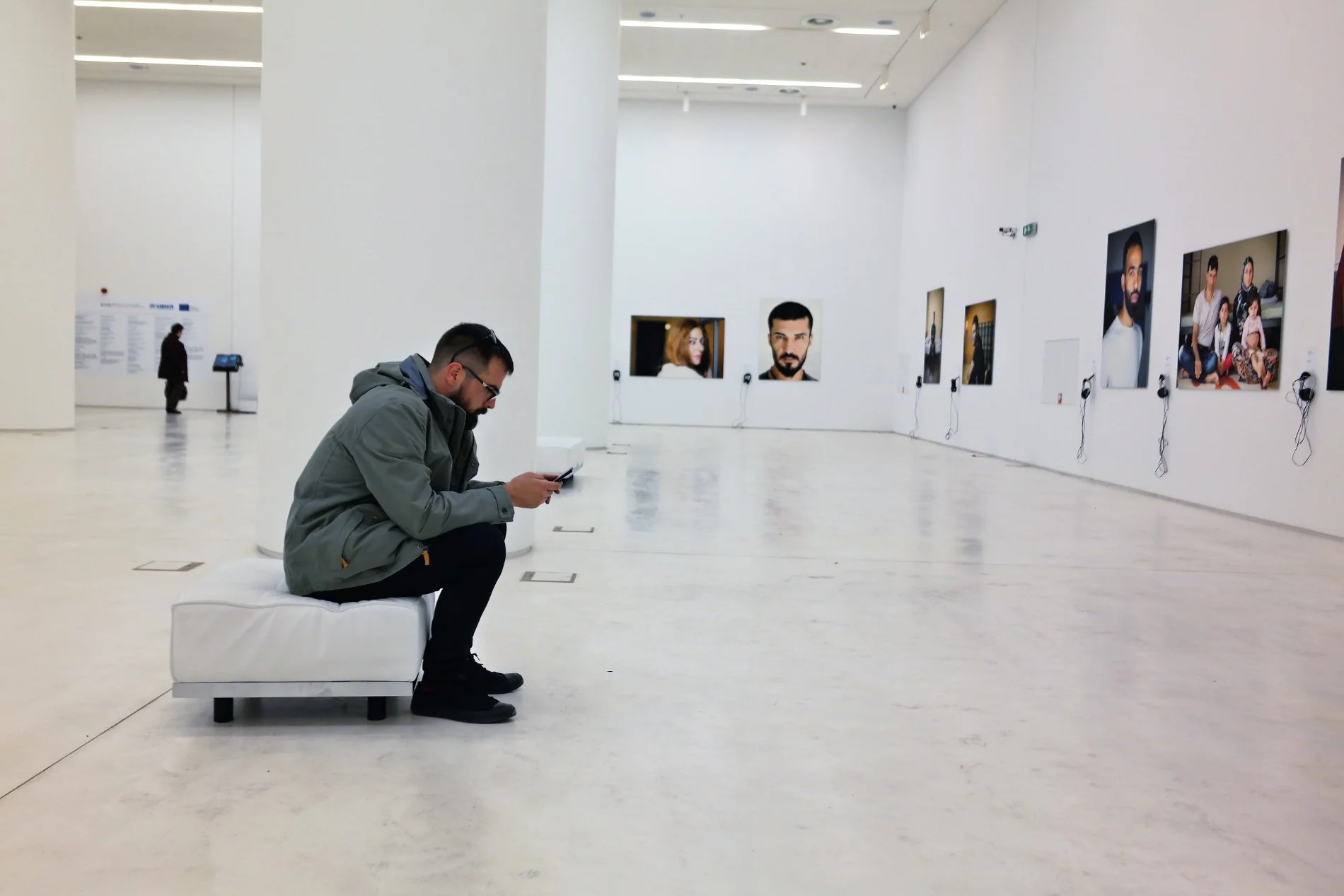 All refugee portraits are presented in a clean wide space at the ground floor of the National Museum of Contemporary Art in Athens.