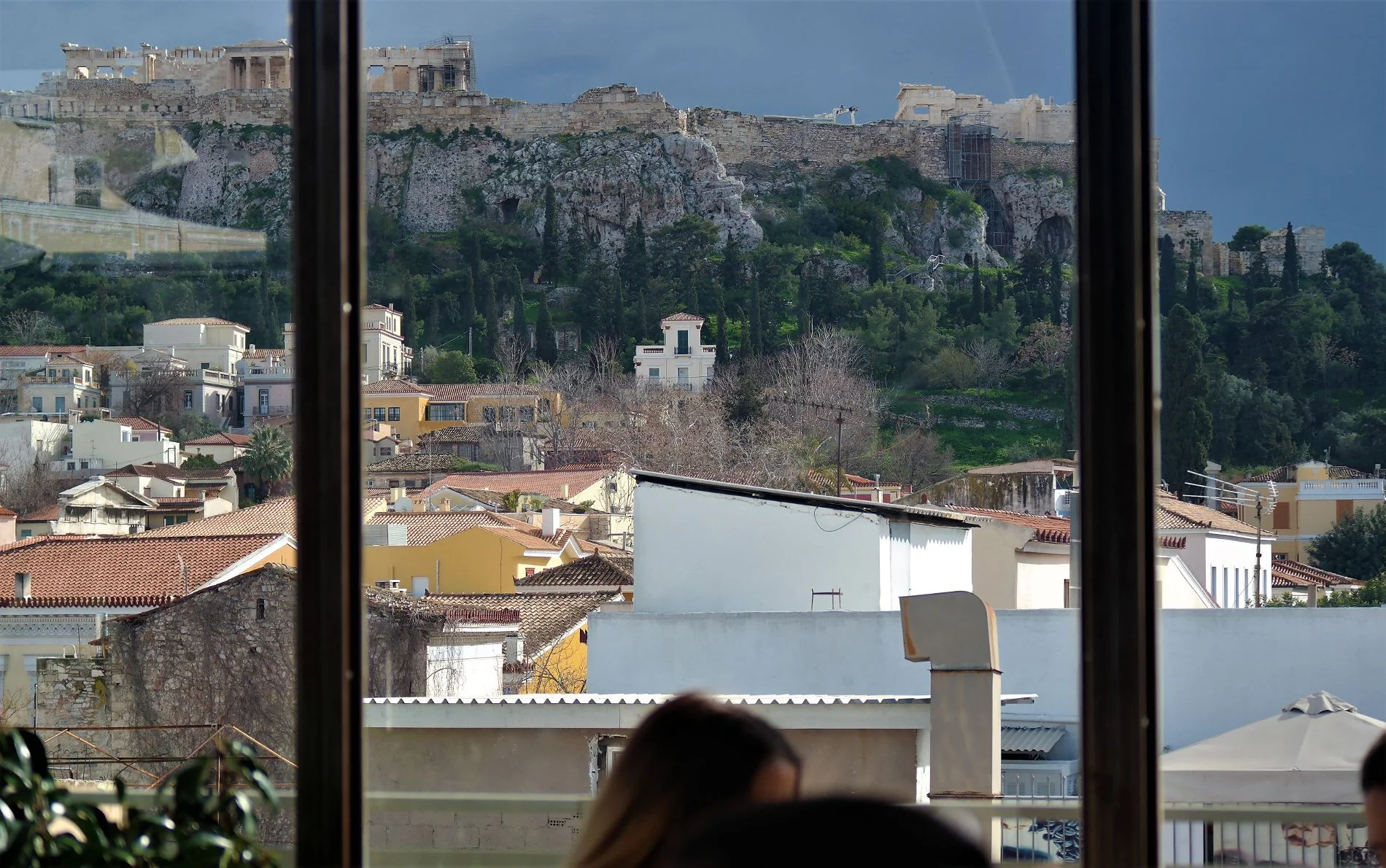 Acropolis looks amazing even with cloudy weather from Couleur Locale's rooftop bar. Source: Truevoyagers