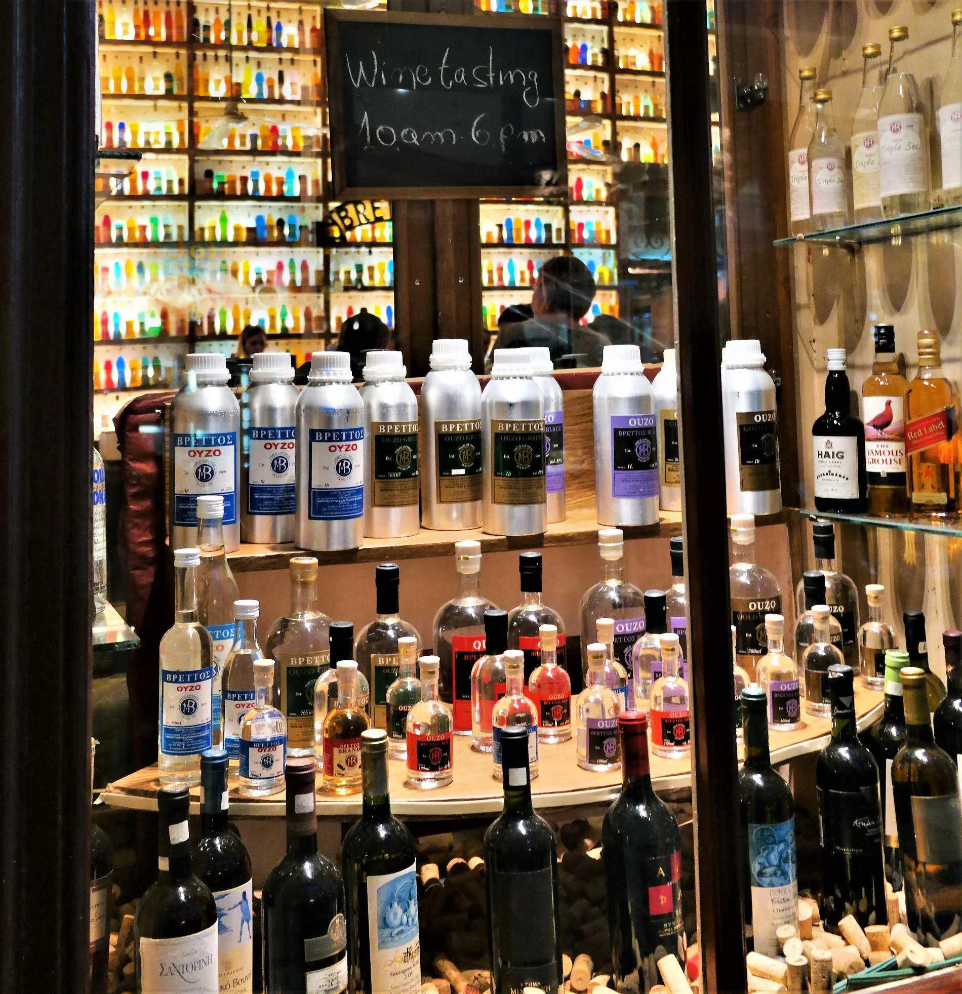 Ouzo in various bottles and sizes in Vrettos bar, Psyrri, Athens. Source: Truevoyagers