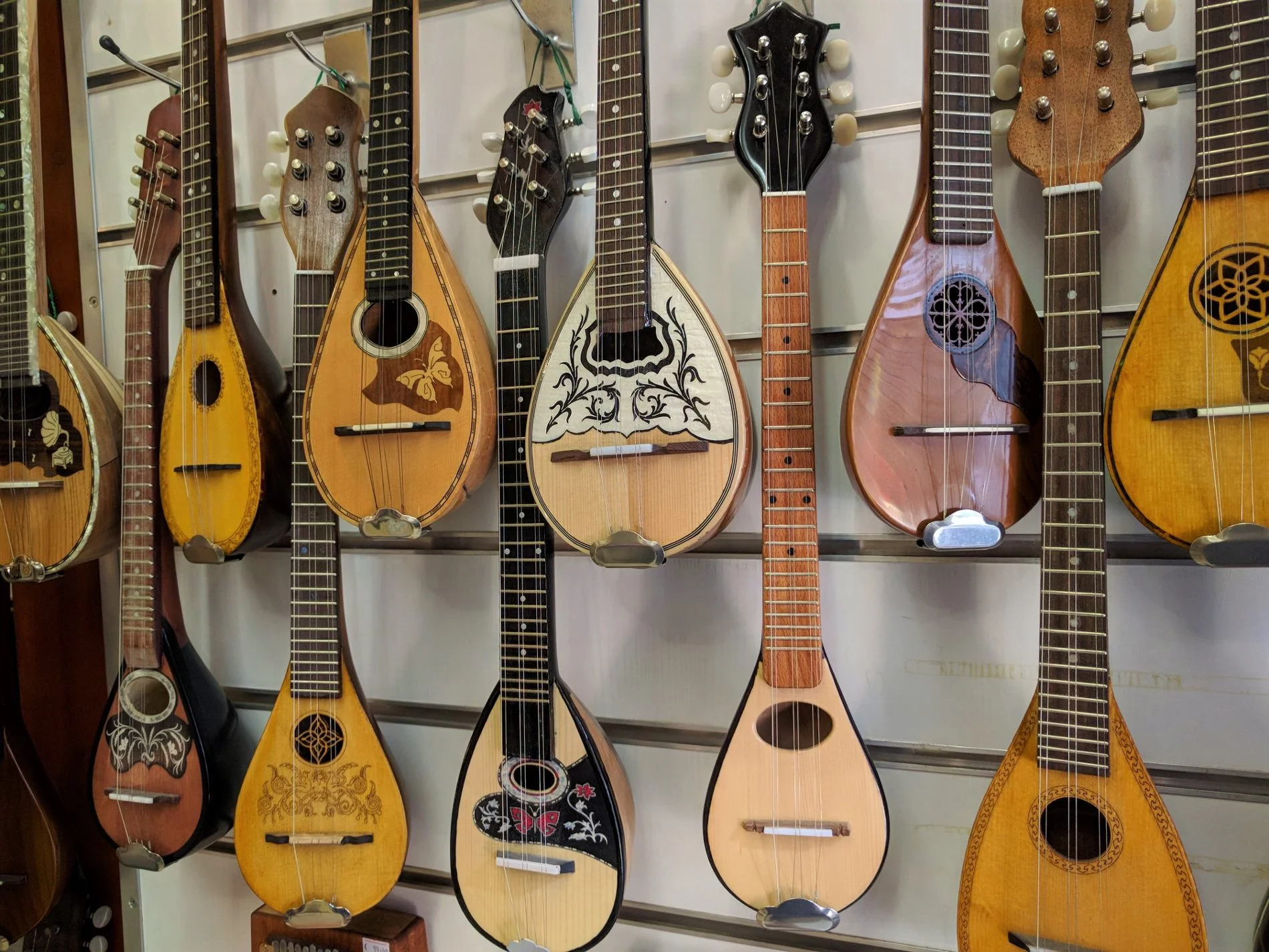 All different types of " bouzouki " as found in Pandrossou str. in Monastiraki. Source: Truevoyagers