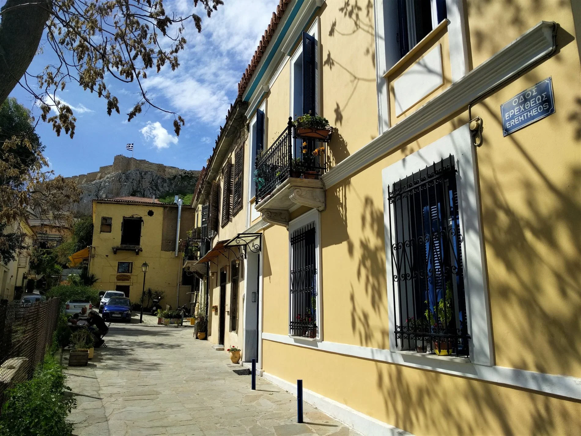 Stroll around Plaka and observe the full of character quaint colorful buildings. Source: Truevoyagers