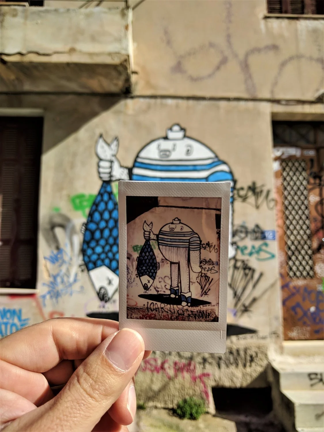 Another cute graffiti on a polaroid image, captured in our " Athens Instagram Photo Tour ".