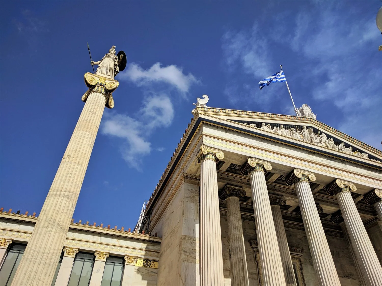 Athena's statue can be also found next to the building of the Academy of Athens right outside Panepistimio metro station in Athens. Source: Truevoyagers