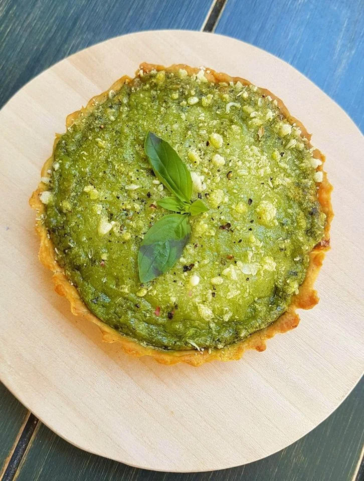Handmade coconut milk basil pesto, buckwheat and caramelized onion tart by Vegan Nation. Source: Vegan Nation