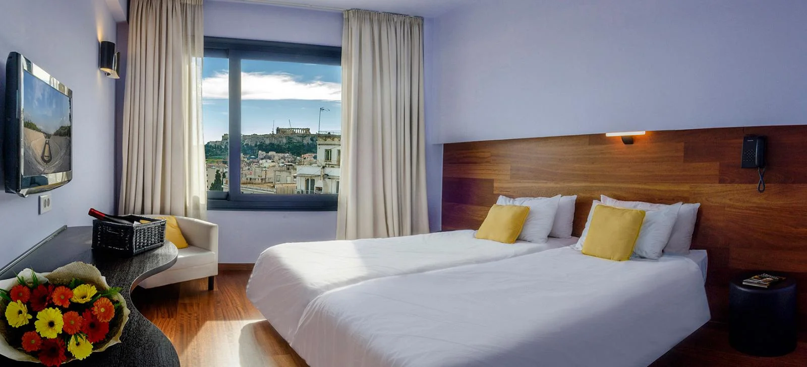 Athens Center Square: A modern and budget-friendly hotel featuring a rooftop terrace with panoramic views.